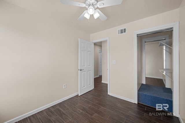 unfurnished bedroom featuring a closet and ceiling fan