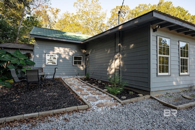 view of home's exterior with a patio area