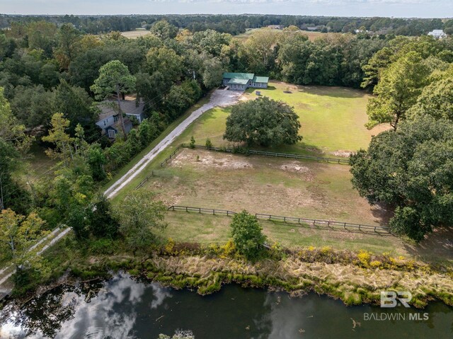 aerial view with a rural view and a water view