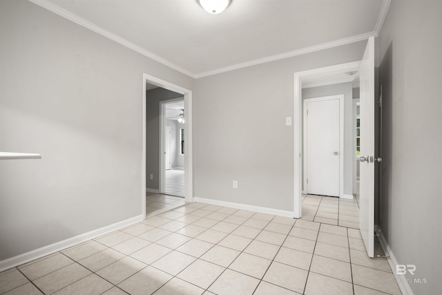 963 Shady Brook Dr, Mobile, AL 36606 - empty room featuring crown molding, baseboards, light tile patterned floors, and a ceiling fan