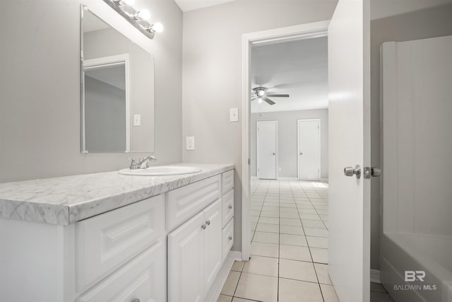963 Shady Brook Dr, Mobile, AL 36606 - full bath with vanity, tile patterned flooring, a ceiling fan, and baseboards
