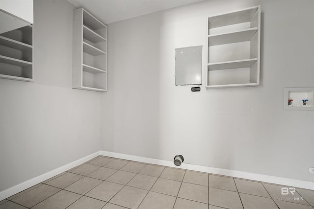 963 Shady Brook Dr, Mobile, AL 36606 - laundry room featuring baseboards, washer hookup, and tile patterned flooring
