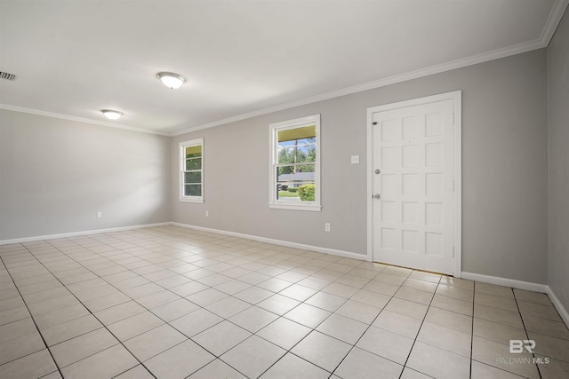 963 Shady Brook Dr, Mobile, AL 36606 - empty room featuring crown molding, baseboards, and light tile patterned floors