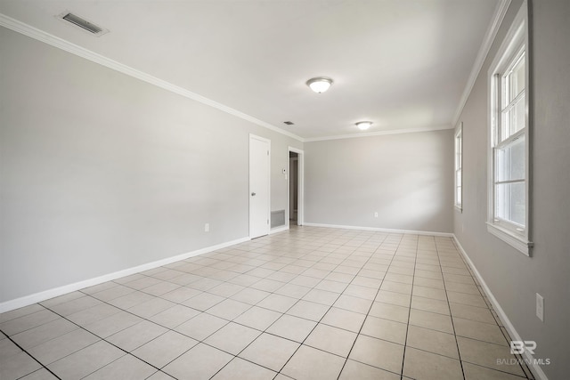 963 Shady Brook Dr, Mobile, AL 36606 - spare room with crown molding, baseboards, and light tile patterned flooring
