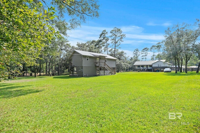 view of yard featuring a deck