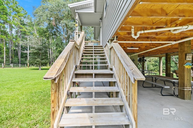 stairs featuring view of scattered trees