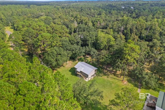 drone / aerial view of a heavily wooded area