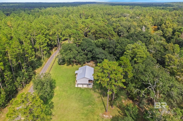view from above of property featuring a forest