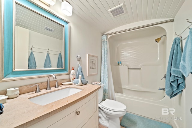 full bathroom featuring shower / bathtub combination with curtain, vanity, and toilet