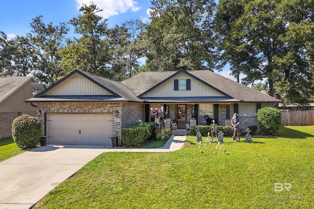 view of front facade featuring a front yard and a garage