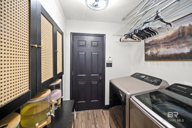 washroom featuring washer and dryer and hardwood / wood-style flooring