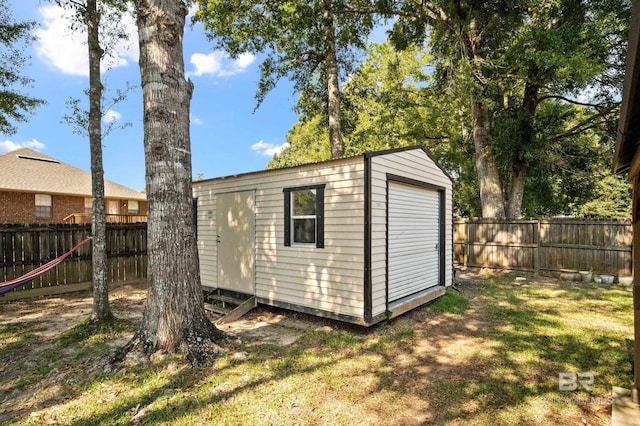 view of outdoor structure featuring a yard