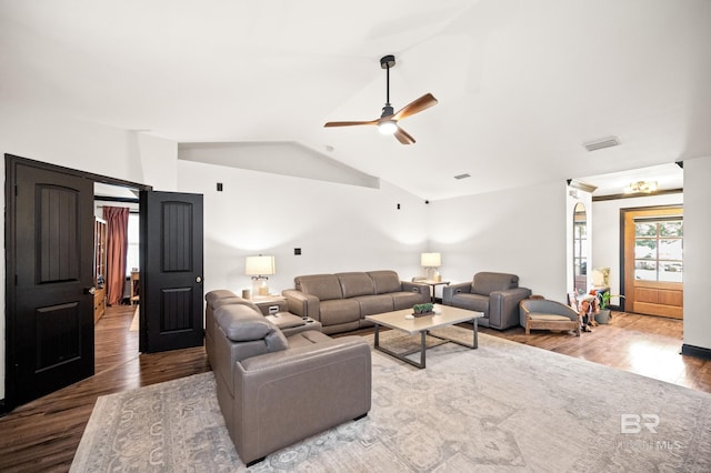 living room featuring hardwood / wood-style flooring, ceiling fan, and lofted ceiling