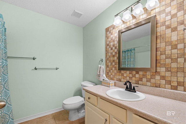 full bath featuring vanity, visible vents, tile patterned flooring, a textured ceiling, and toilet