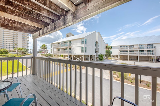 26115 Perdido Beach Blvd Unit 4-A, Orange Beach, AL 36561 - wooden deck featuring a residential view