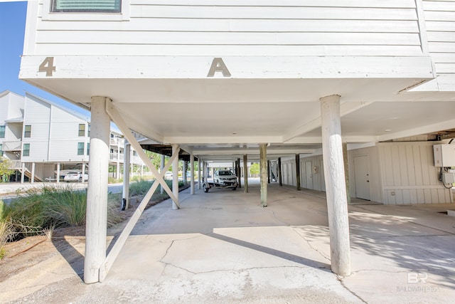 26115 Perdido Beach Blvd Unit 4-A, Orange Beach, AL 36561 - view of patio featuring a carport