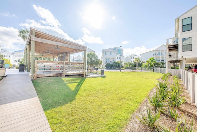 26115 Perdido Beach Blvd Unit 4-A, Orange Beach, AL 36561 - view of yard with a residential view and a deck