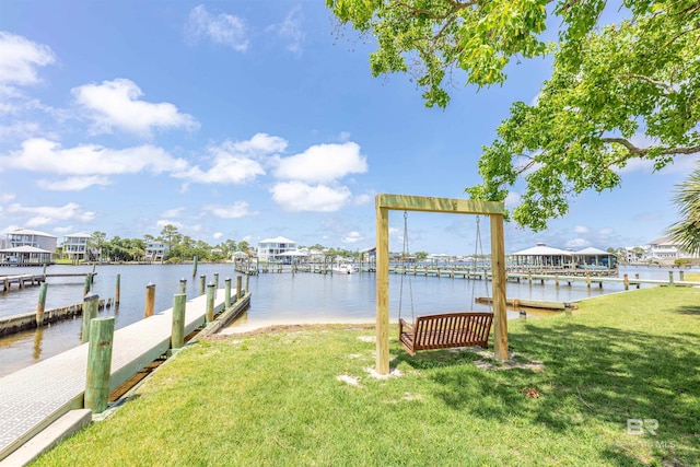 26115 Perdido Beach Blvd Unit 4-A, Orange Beach, AL 36561 - dock area featuring a lawn and a water view