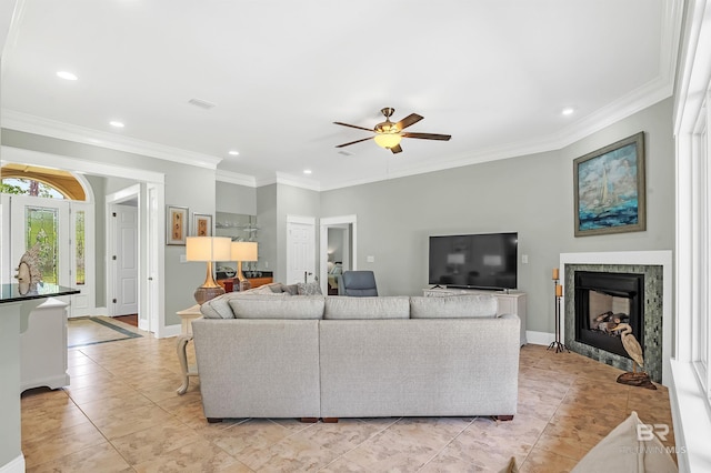 8954 Bay Point Dr, Elberta, AL 36530 - living room with crown molding, a ceiling fan, baseboards, and recessed lighting