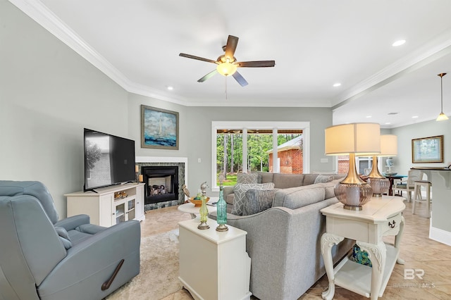 8954 Bay Point Dr, Elberta, AL 36530 - living room featuring ornamental molding, a fireplace, a ceiling fan, and recessed lighting