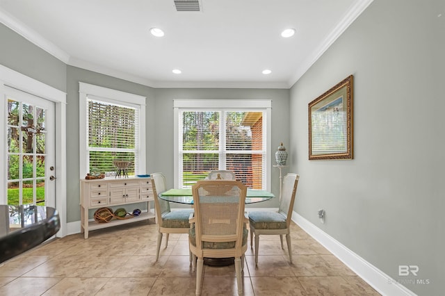 8954 Bay Point Dr, Elberta, AL 36530 - dining area with crown molding, recessed lighting, and baseboards