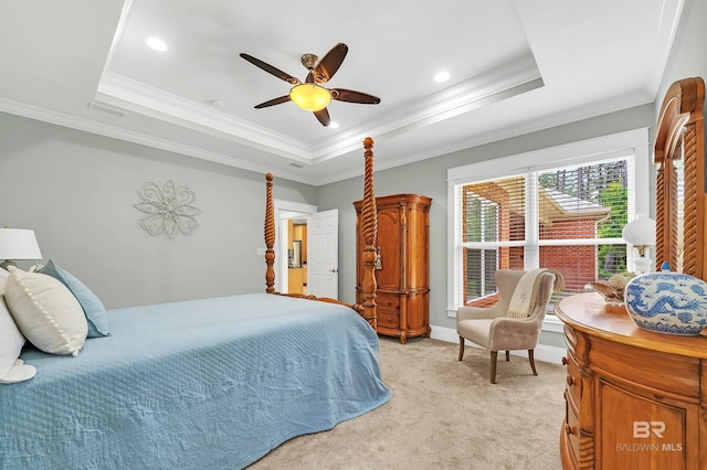 8954 Bay Point Dr, Elberta, AL 36530 - bedroom with light carpet, a ceiling fan, a tray ceiling, visible vents, and ornamental molding
