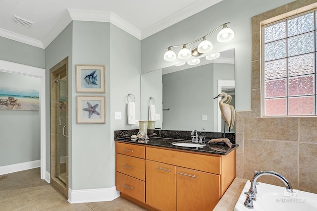 8954 Bay Point Dr, Elberta, AL 36530 - bathroom featuring visible vents, plenty of natural light, crown molding, and a stall shower