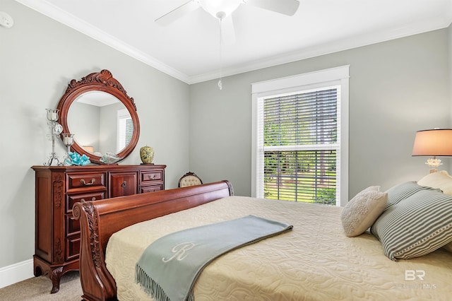 8954 Bay Point Dr, Elberta, AL 36530 - carpeted bedroom with crown molding, a ceiling fan, and baseboards