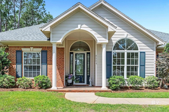 8954 Bay Point Dr, Elberta, AL 36530 - entrance to property featuring brick siding and roof with shingles
