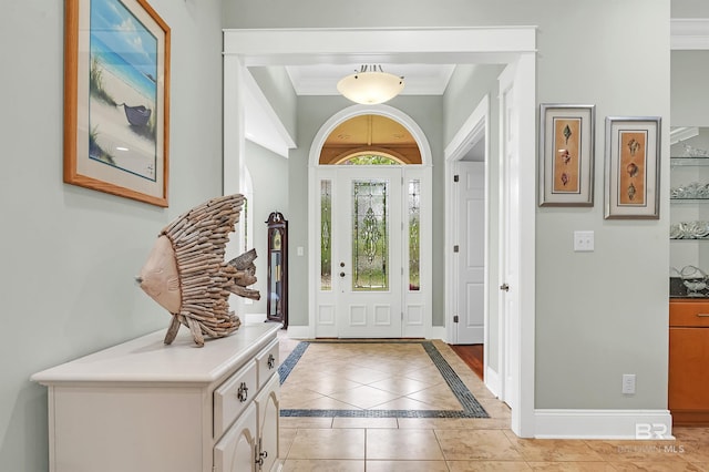 8954 Bay Point Dr, Elberta, AL 36530 - entrance foyer featuring baseboards, ornamental molding, and light tile patterned flooring