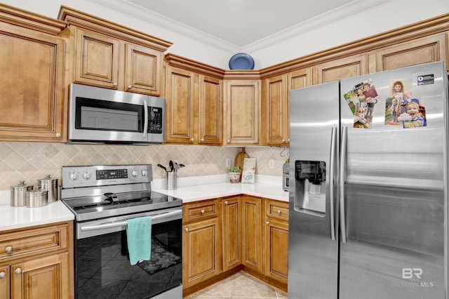 kitchen featuring backsplash, light tile patterned floors, ornamental molding, and appliances with stainless steel finishes