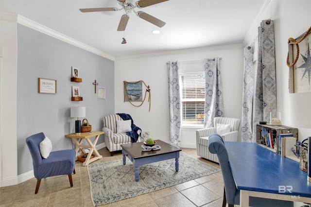 living area with tile patterned floors, ornamental molding, and ceiling fan