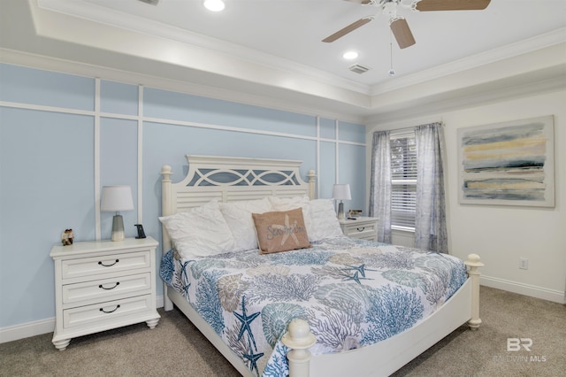 bedroom with crown molding, ceiling fan, a raised ceiling, and carpet floors