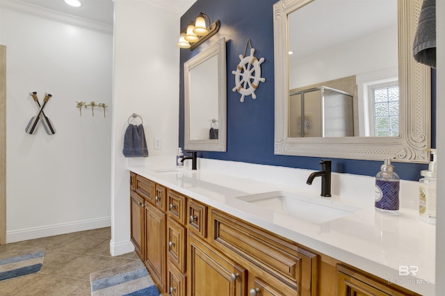 bathroom featuring walk in shower, tile patterned floors, vanity, and crown molding