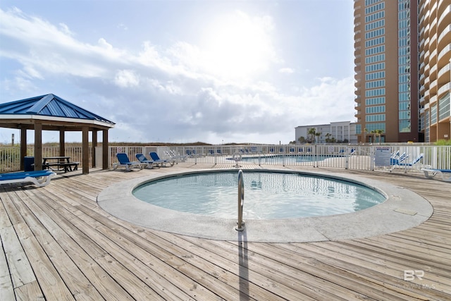 view of swimming pool with a gazebo