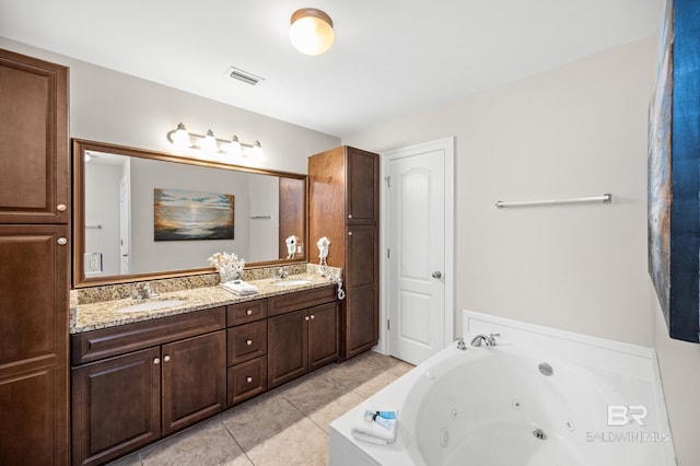23450 Perdido Beach Blvd Unit 2209, Orange Beach, AL 36561 - full bath with double vanity, a whirlpool tub, and tile patterned floors