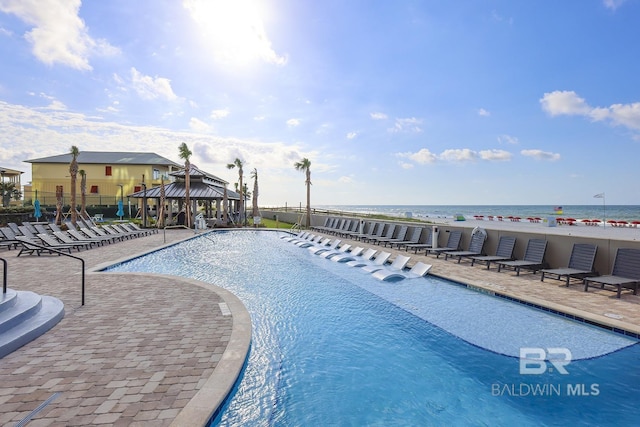23450 Perdido Beach Blvd Unit 2209, Orange Beach, AL 36561 - community pool with a gazebo, a patio, and a water view