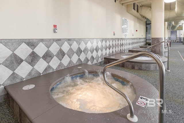 23450 Perdido Beach Blvd Unit 2209, Orange Beach, AL 36561 - detailed view of a wainscoted wall and a hot tub