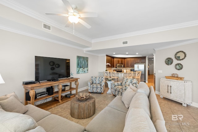 23450 Perdido Beach Blvd Unit 2209, Orange Beach, AL 36561 - living room featuring crown molding, ceiling fan, and light tile patterned flooring