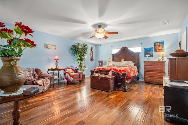 bedroom featuring hardwood / wood-style flooring and ceiling fan