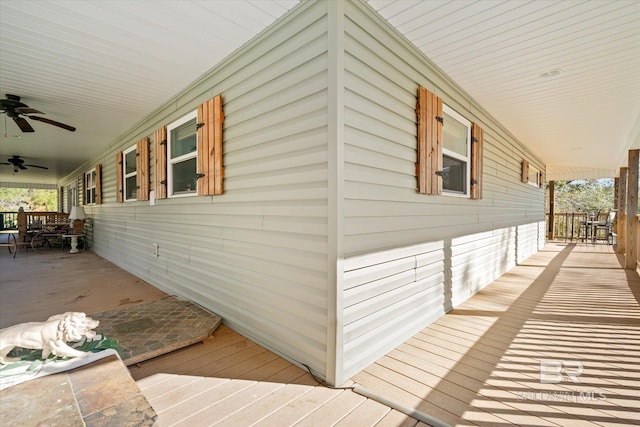 view of property exterior featuring ceiling fan