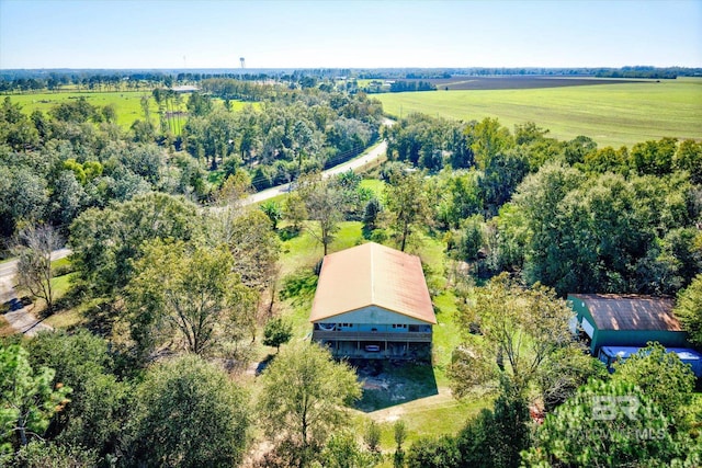 birds eye view of property with a rural view