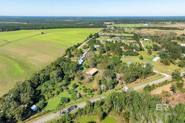 birds eye view of property featuring a rural view