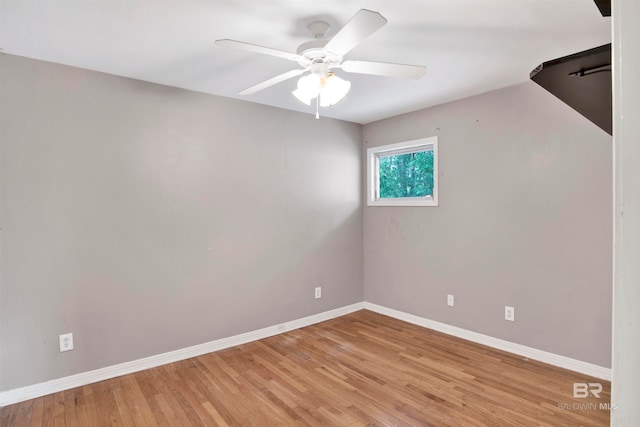 unfurnished room with light hardwood / wood-style flooring and ceiling fan