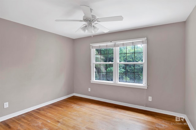 unfurnished room with light hardwood / wood-style floors and ceiling fan