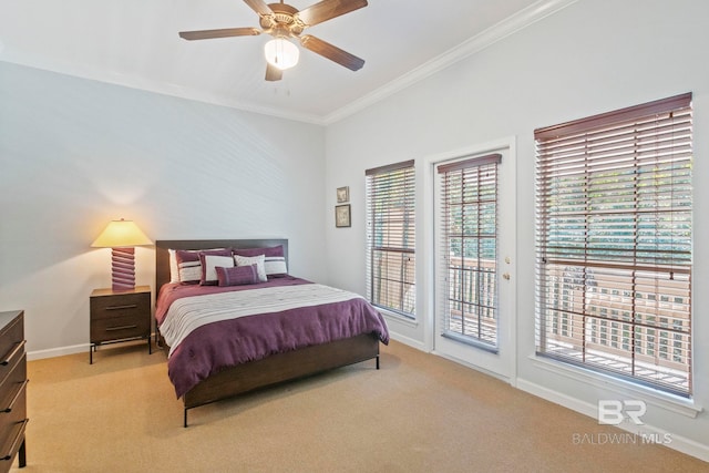 carpeted bedroom with crown molding, access to exterior, and ceiling fan