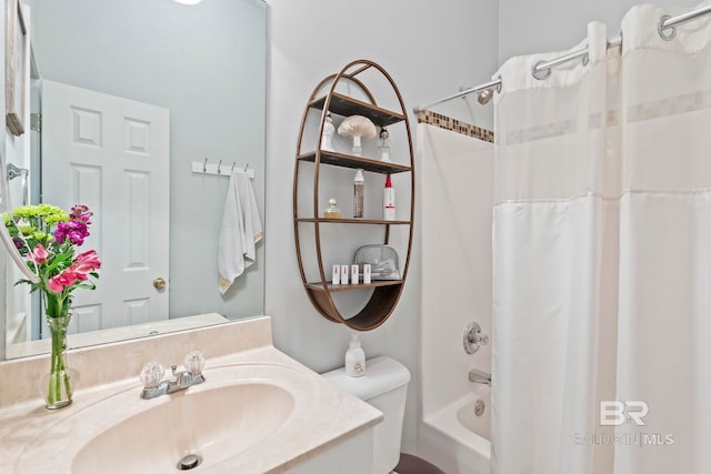 full bathroom with vanity, toilet, and shower / bath combo with shower curtain