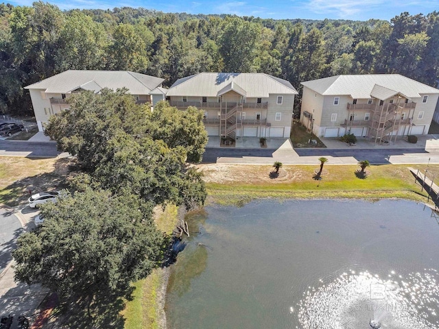 bird's eye view with a water view