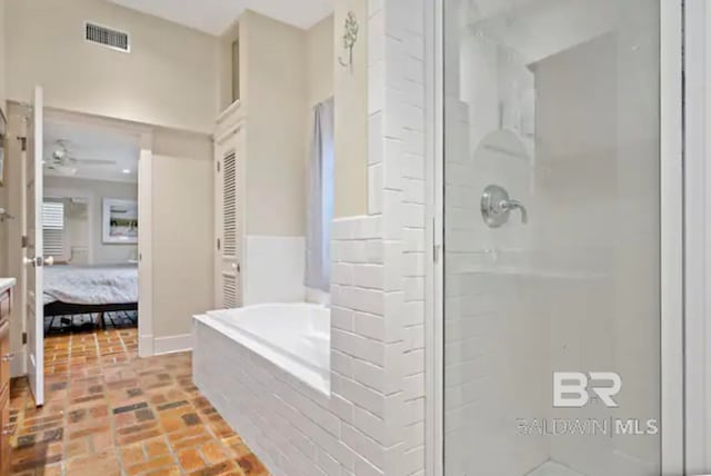 bathroom featuring shower with separate bathtub and ceiling fan