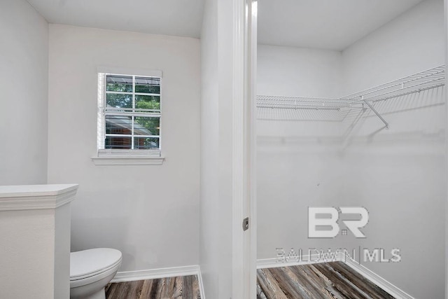 31246 Shambo Rd, Spanish Fort, AL 36527 - bathroom with toilet and wood finished floors